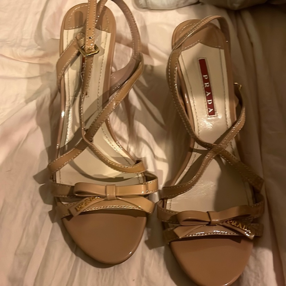 Prada sandles have been worn but are in good condition, a couple of stains.